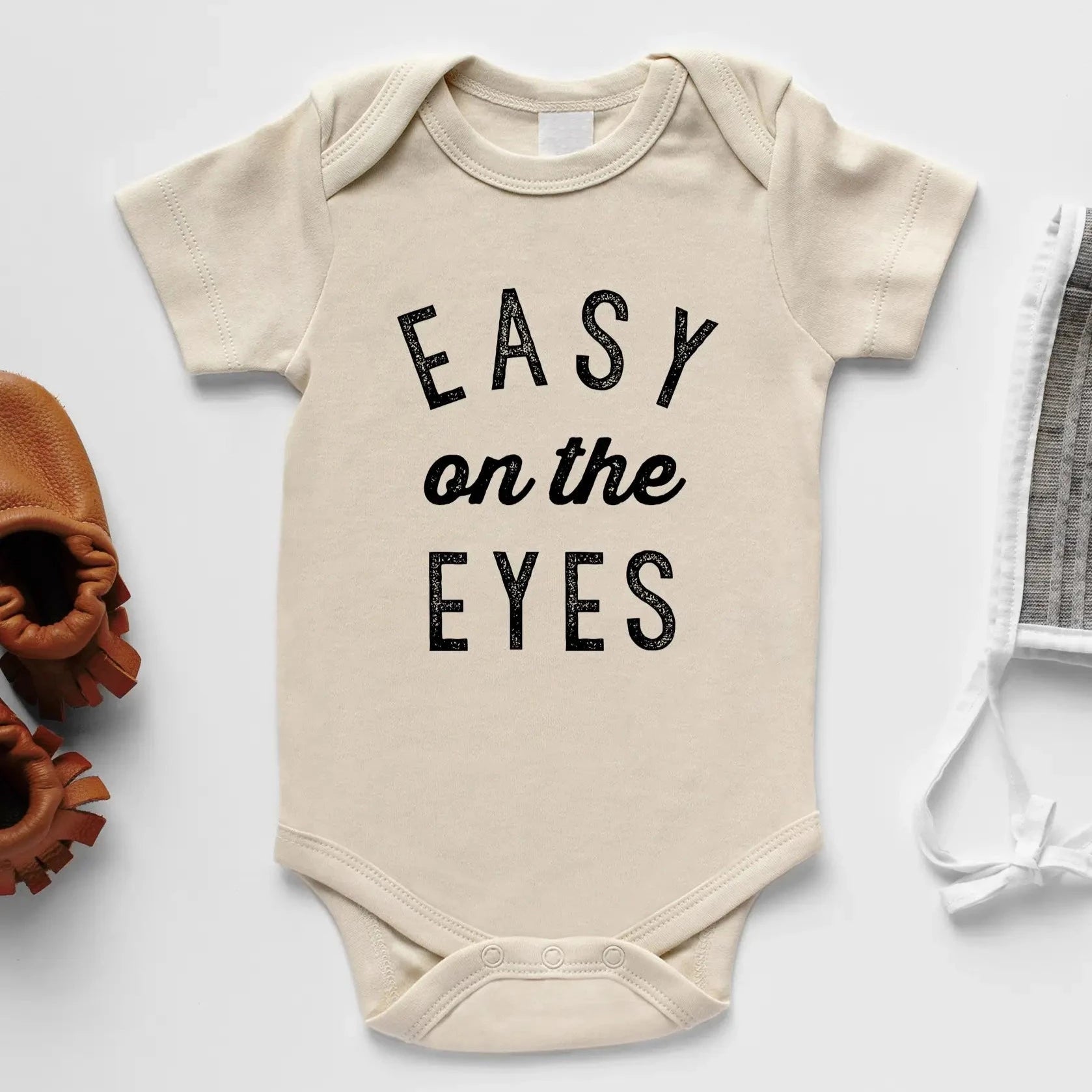 EASY ON THE EYES ONESIE