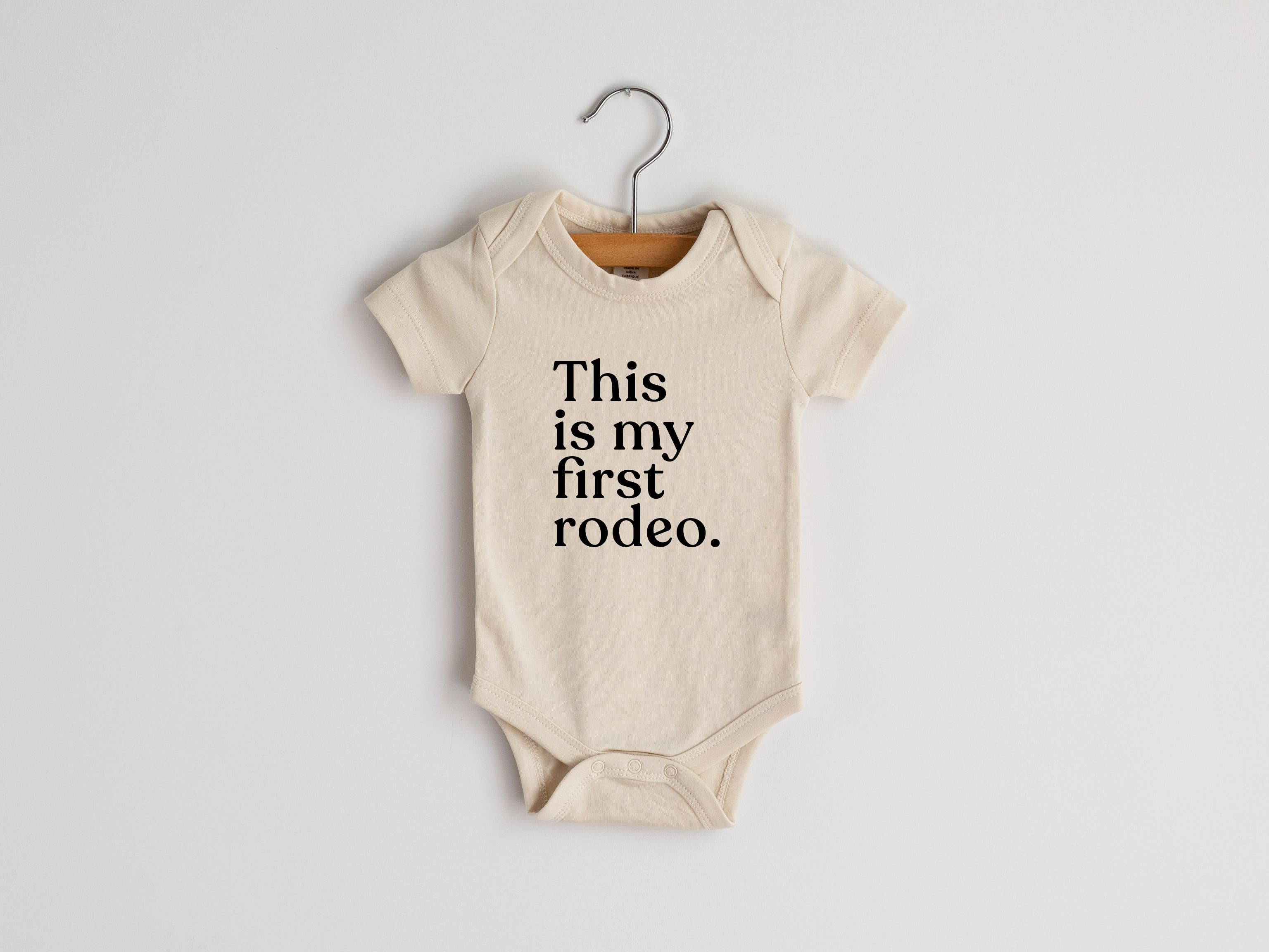 THIS IS MY FIRST RODEO BABY ORGANIC COTTON ONESIE